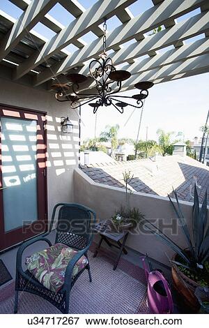 Wicker furniture on upstairs patio; Seal Beach; California; USA View Large Photo Image Stock Photo - Wicker furniture on upstairs patio; Seal Beach; California; USA. Fotosearch
