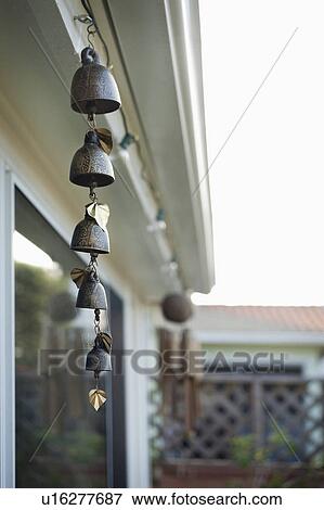 Wind chime hanging at porch View Large Photo Image Stock Photo - Wind chime hanging at porch. Fotosearch