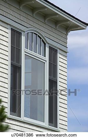 Stock Photograph - Window of single family home. Fotosearch