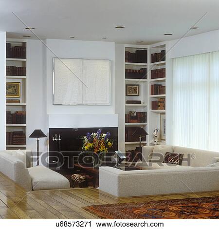 Stock Fotografie - wohnzimmer, -, modernes, creme, sofas, in ... Stock Fotografie - wohnzimmer, -, modernes, creme, sofas, in ...