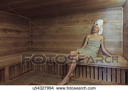 Woman in sauna View Large Photo Image Picture - Woman in sauna. Fotosearch