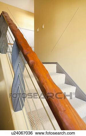 Stock Photograph - Wood and wire railing going down staircase; Burbank; California; USA. Fotosearch
