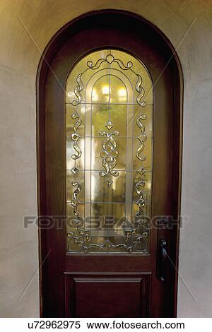 Stock Photography - Wooden and glass front door; Laguna Beach; California; USA. Fotosearch