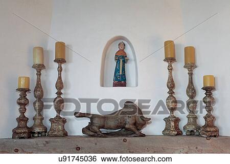 Wooden bull on mantel between candlesticks, USA, New Mexico, Santa Fe View Large Photo Image Stock Photograph - Wooden bull on mantel between candlesticks, USA, New Mexico, Santa Fe. Fotosearch