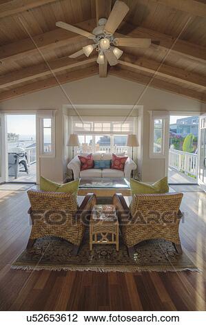 Stock Image - Wooden ceiling in traditional living room, Laguna Beach, California, USA. Fotosearch
