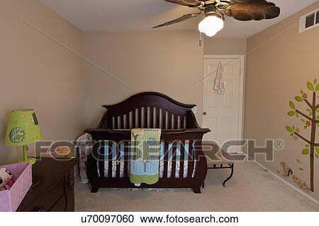 Wooden crib in baby nursery, Laguna Beach, California, USA View Large Photo Image Stock Image - Wooden crib in baby nursery, Laguna Beach, California, USA. Fotosearch