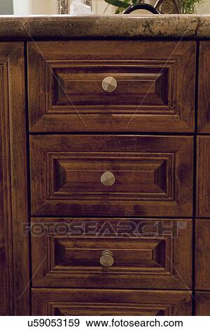 Stock Photo - Wooden drawers in bathroom; Laguna Beach; California; USA. Fotosearch
