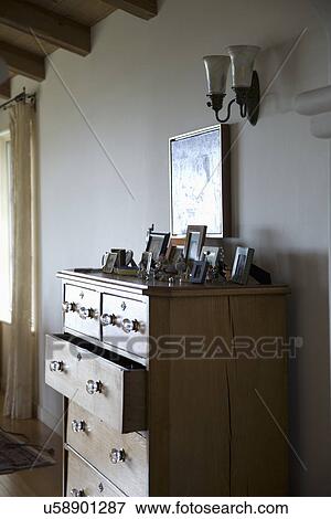 Wooden dresser with open drawer; Carpinteria; California; USA View Large Photo Image Stock Photo - Wooden dresser with open drawer; Carpinteria; California; USA. Fotosearch