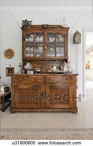 Stock Photography - Wooden hutch cupboard in traditional home. Fotosearch