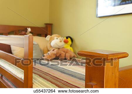 Picture - Wooden railing on child's bed; Burbank; California; USA. Fotosearch