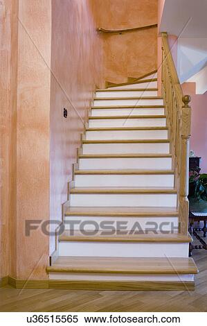 Stock Photography - Wooden staircase in traditional home. Fotosearch