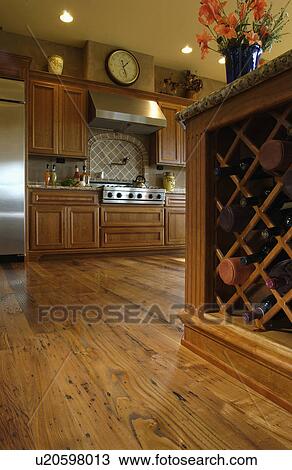 Wooden wine storage rack in domestic kitchen View Large Photo Image Stock Image - Wooden wine storage rack in domestic kitchen. Fotosearch