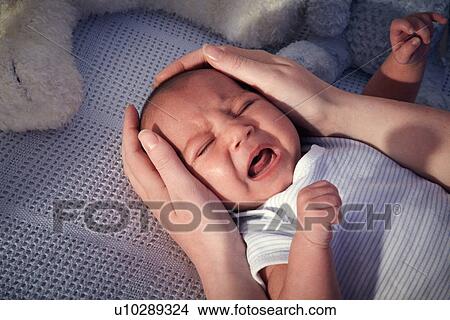 Baby boy in crib crying View Large Photo Image Picture - Baby boy in crib crying. Fotosearch