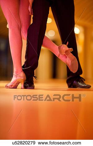 Ballroom dancers in dance studio, low section View Large Photo Image Stock Photo - Ballroom dancers in dance studio, low section. Fotosearch