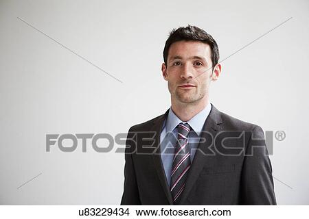 Picture - Candid portrait of businessman. Fotosearch