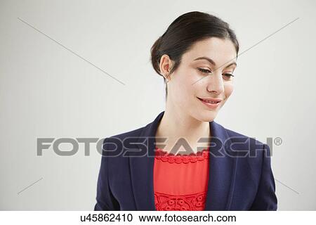 Stock Image - Candid portrait of businesswoman. Fotosearch