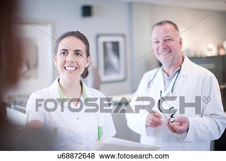 Stock Photo - Candid portrait of doctor and nurse. Fotosearch