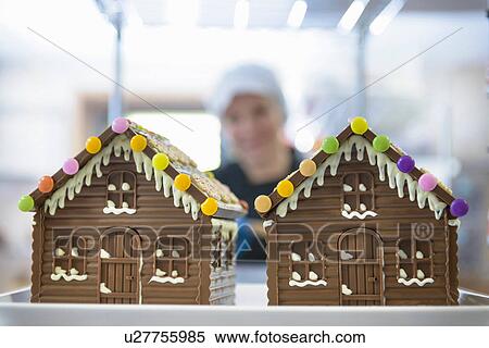 Close up of chocolate houses made in sweet factory View Large Photo Image Stock Photography - Close up of chocolate houses made in sweet factory. Fotosearch