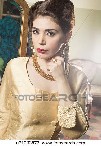 Stock Photo - Close up of woman in vintage clothes. Fotosearch