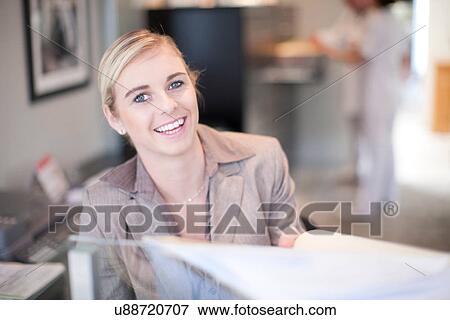 Close up portrait of hospital receptionist View Large Photo Image Stock Photo - Close up portrait of hospital receptionist. Fotosearch