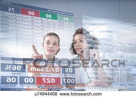Customer service operators looking at interactive screen View Large Photo Image Stock Photo - Customer service operators looking at interactive screen. Fotosearch