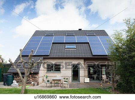 Detached bungalow with solar panels on roof View Large Photo Image Stock Image - Detached bungalow with solar panels on roof. Fotosearch
