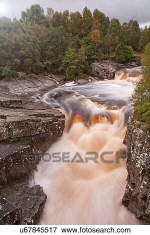 Stock Photo - Elevated view of remote waterfall, Scottish Highlands, Scotland, UK. Fotosearch