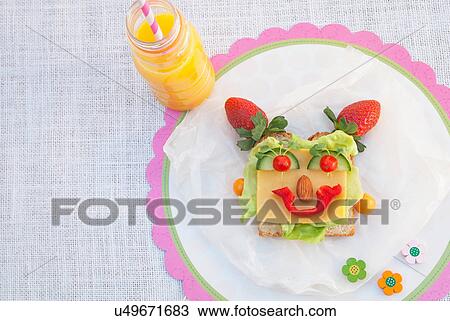 Face made from fresh food on slice of bread View Large Photo Image Stock Image - Face made from fresh food on slice of bread. Fotosearch