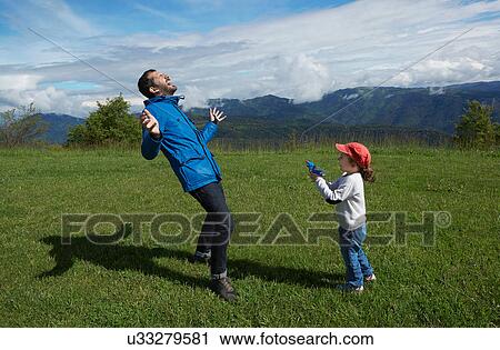 Father and young daughter play acting with toy gun View Large Photo Image Stock Image - Father and young daughter play acting with toy gun. Fotosearch