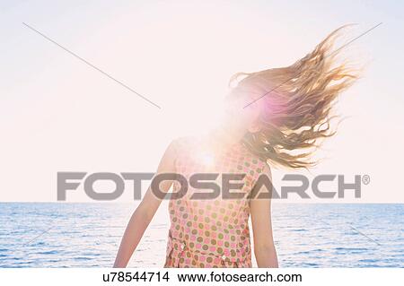Girl jumping on beach View Large Photo Image Picture - Girl jumping on beach. Fotosearch
