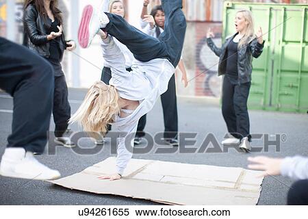 Group of girls breakdancing in playground View Large Photo Image Stock Photography - Group of girls breakdancing in playground. Fotosearch