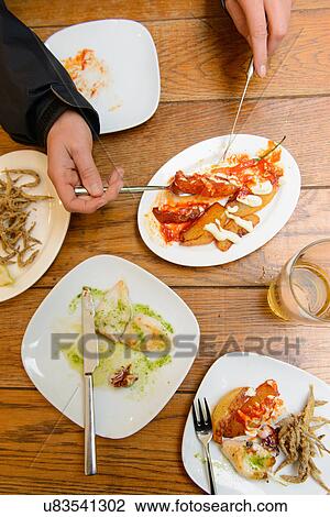 Overhead view of shared tapas Barcelona, Spain View Large Photo Image Stock Image - Overhead view of shared tapas Barcelona, Spain. Fotosearch