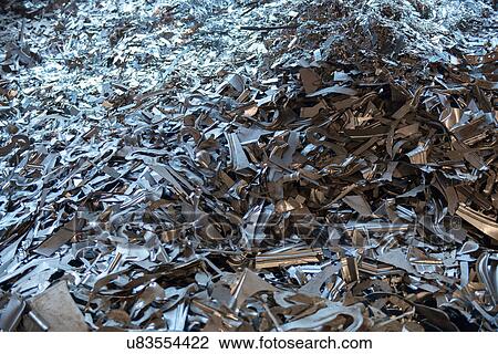 Stock Image - Pile of scrap metal in steel plant. Fotosearch