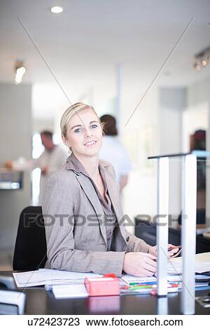 Stock Image - Portrait of hospital receptionist. Fotosearch