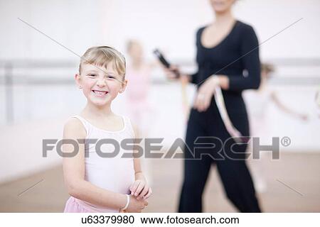 Portrait of mischievous young ballerina View Large Photo Image Stock Image - Portrait of mischievous young ballerina. Fotosearch