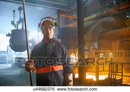 Stock Photography - Portrait of steel worker in steel foundry. Fotosearch