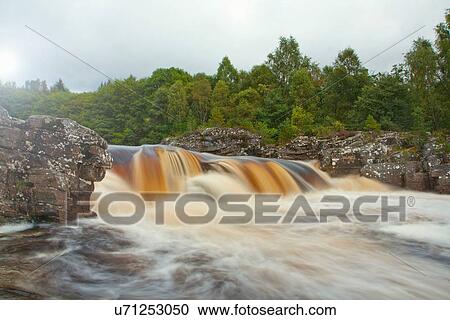 Stock Image - Remote waterfall, Scottish Highlands, Scotland, UK. Fotosearch