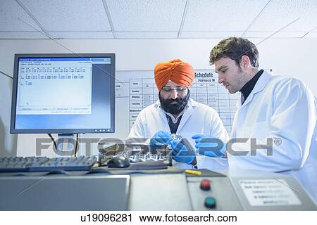 Scientists checking quality of aluminum sample View Large Photo Image Stock Image - Scientists checking quality of aluminum sample. Fotosearch