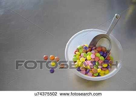 Still life bowl of multi colored sweets View Large Photo Image Stock Image - Still life bowl of multi colored sweets. Fotosearch