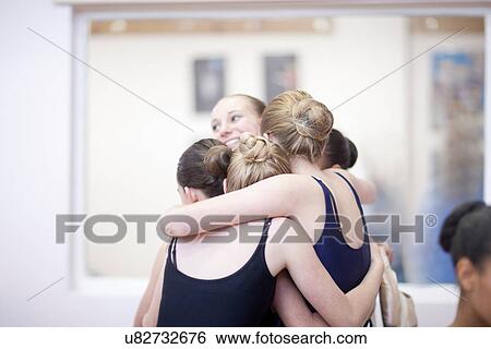 Teenage ballerinas hugging in class View Large Photo Image Stock Photograph - Teenage ballerinas hugging in class. Fotosearch