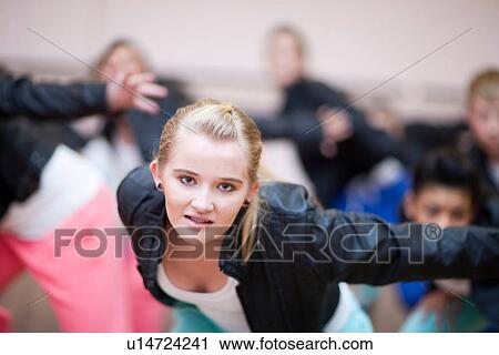 Teenagers practicing hip hop dance in studio View Large Photo Image Stock Image - Teenagers practicing hip hop dance in studio. Fotosearch
