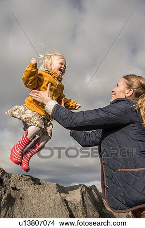 Toddler jumping off wall View Large Photo Image Picture - Toddler jumping off wall. Fotosearch