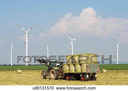 Wind turbines and harvesting, Selfkant, Germany View Large Photo Image Stock Image - Wind turbines and harvesting, Selfkant, Germany. Fotosearch