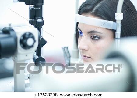 Woman having eye examination View Large Photo Image Stock Photo - Woman having eye examination. Fotosearch