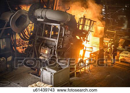 Workers and machinery in steel foundry View Large Photo Image Stock Image - Workers and machinery in steel foundry. Fotosearch