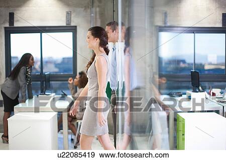 Workers in city office View Large Photo Image Stock Photo - Workers in city office. Fotosearch