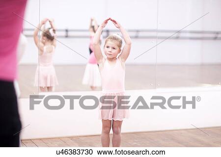 Young ballerinas posing in dance studio View Large Photo Image Stock Image - Young ballerinas posing in dance studio. Fotosearch