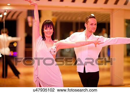 Young ballroom dancers in pose, portrait View Large Photo Image Stock Image - Young ballroom dancers in pose, portrait. Fotosearch