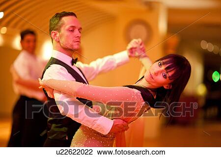 Young ballroom dancers in studio View Large Photo Image Stock Image - Young ballroom dancers in studio. Fotosearch