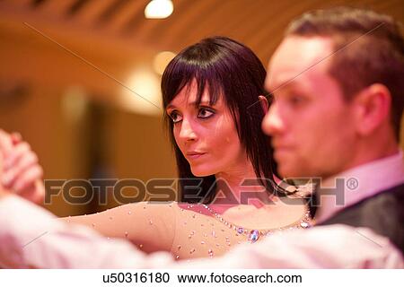 Young ballroom dancers looking away View Large Photo Image Stock Image - Young ballroom dancers looking away. Fotosearch